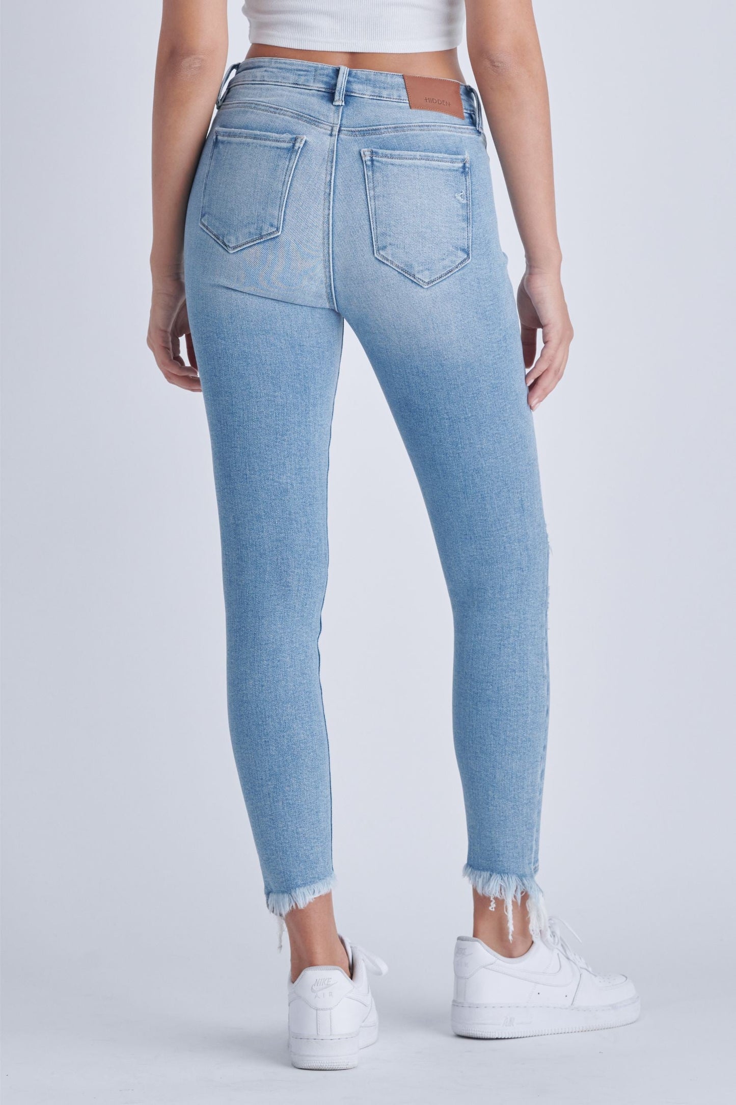 Hidden Light Distressed Uneven Hem Skinny Jean